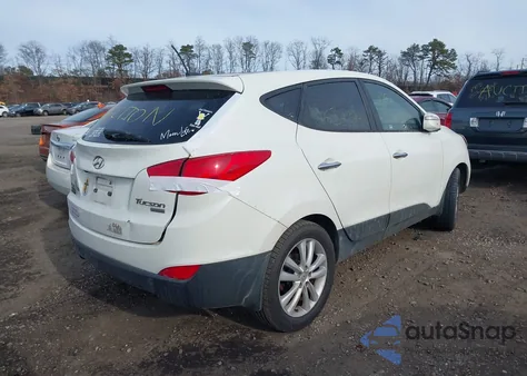 2011 Hyundai Tucson Limited z USA, uszkodzony, nr VIN KM8JU3ACXBU220000